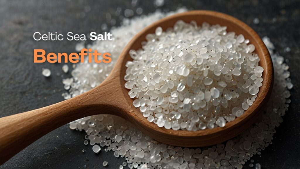 Person sprinkling coarse Celtic sea salt over a fresh green salad.