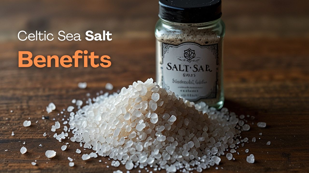A small bowl of gray, moist Celtic sea salt crystals next to a lemon.